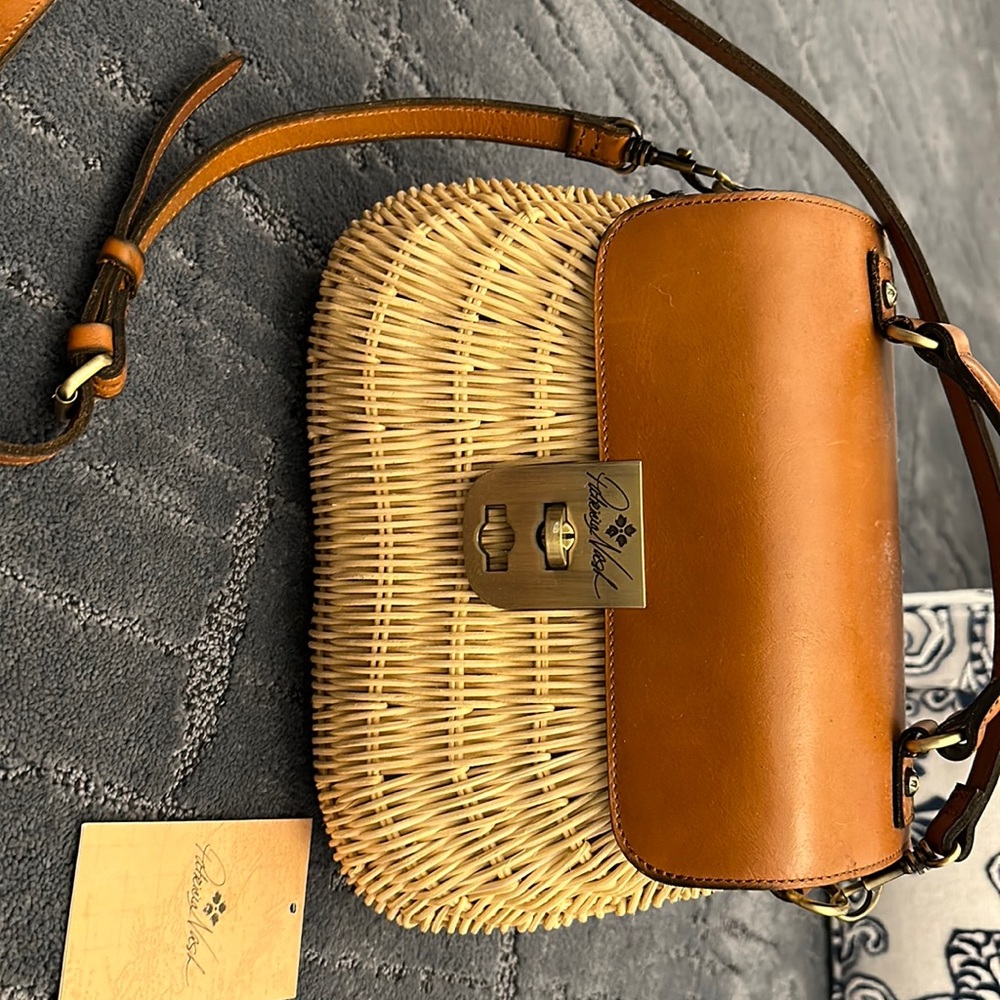Wicker and leather handbag 11 inches across bottom 9 inches top to bottom
